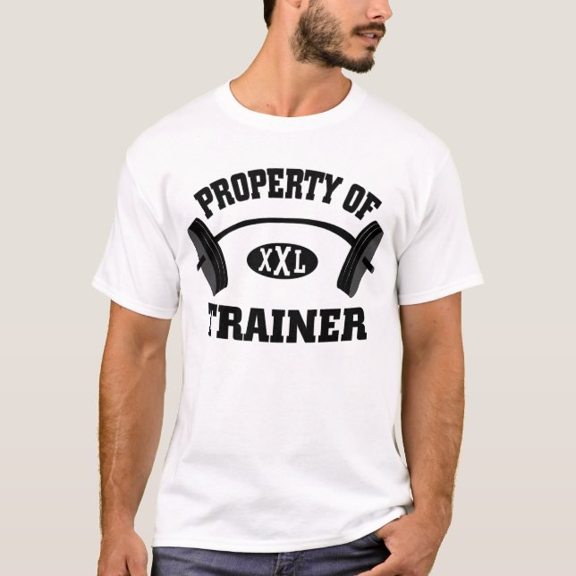 Propiedad de la camiseta del instructor del peso (Anverso)