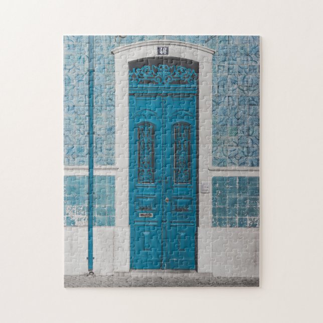 Puerta de madera azul en rompecabezas de rompecabe (Vertical)