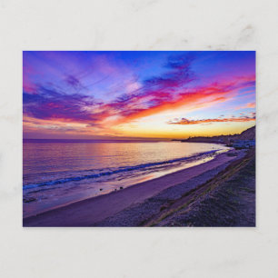 puesta de sol en la postal de la playa