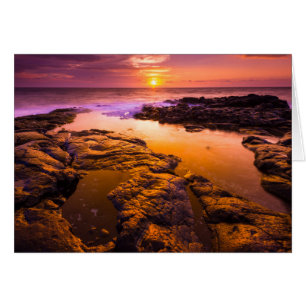 Puesta de sol sobre pozas de marea, Hawái