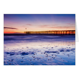 Puesta de sol sobre Ventura Pier y la playa