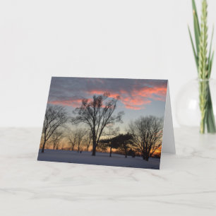 Puesta del sol del invierno y tarjeta de