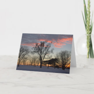 Puesta del sol del invierno y tarjeta de