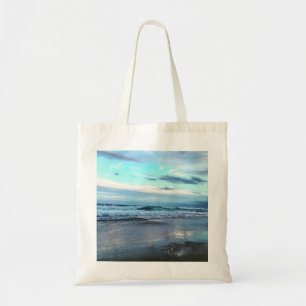 Puesta del sol del océano de la bolsa de asas del