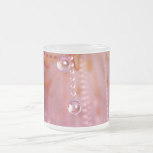 Puesta del sol en la taza cristalina