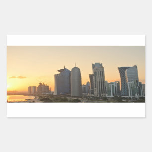 Puesta del sol sobre pegatina rectangular de Doha,