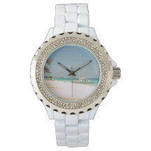 Reloj de esmalte blanco con diseño de playa