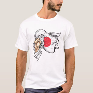 Puño con bandera nacional de la camiseta de Japón