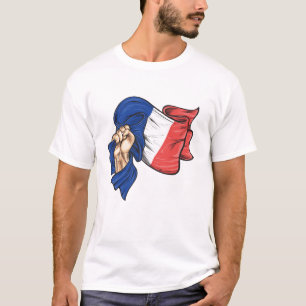 Puño con bandera nacional de la camiseta francesa