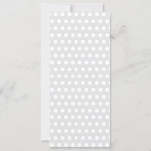 Puntos blancos sobre el gris pálido