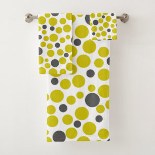 puntos de polka gris amarillo sobre fondo blanco