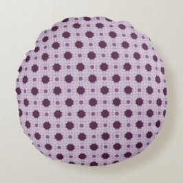 Puntos de polka morado alrededor de la almohada