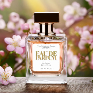 Purpurina de oro y etiqueta Eau de Parfum blanca