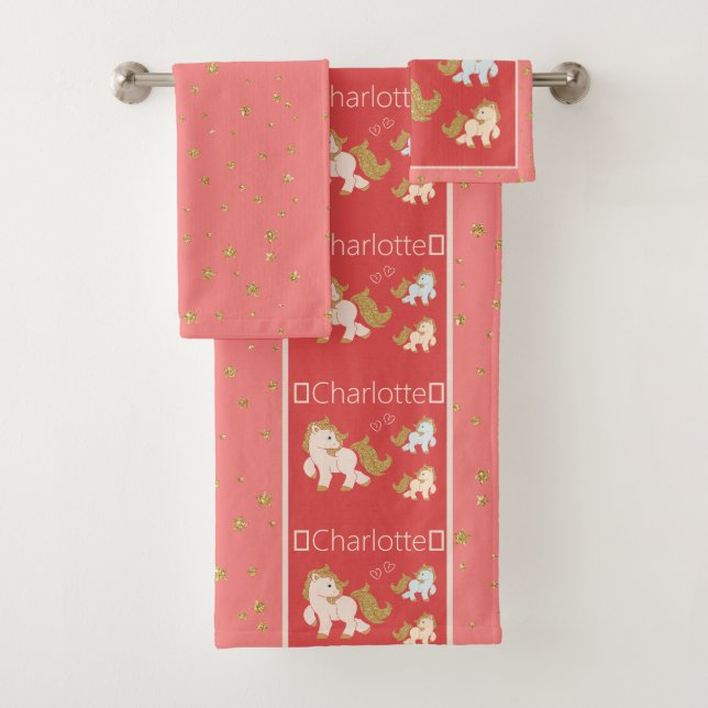 Purpurina rosa pone con nombre a pequeña niña en e (In situ)