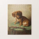 Puzzle A Dachshund Puppy | Carl Reichert<br><div class="desc">A Dachshund Puppy (1888) | Carl Reichert’s A Dachshund Puppy is a delightful portrait featuring a small brown dachshund puppy perched on a wooden stool. The artwork captures the puppy’s curious and innocent expression with exquisite detail, from the soft texture of its fur to the subtle shading of its surroundings....</div>