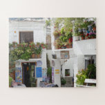Puzzle Andalucía Calle peatonal España Europa Viaje<br><div class="desc">Esta pintoresca calle peatonal es un personaje exuberante con plantas de olla,  tiendas y un banco que muestra la belleza de este pueblo español.</div>