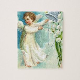 Puzzle Ángel del bebé con una Campana Azul