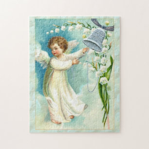 Puzzle Ángel del bebé con una Campana Azul