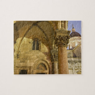 Puzzle Arcos del Palacio Rector con la Catedral de Dubrov