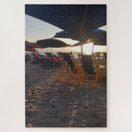 Puzzle Asientos de playa sombreados al atardecer