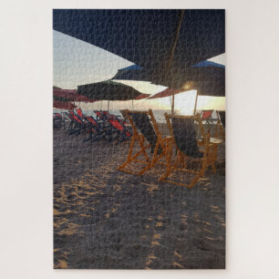 Puzzle Asientos de playa sombreados al atardecer