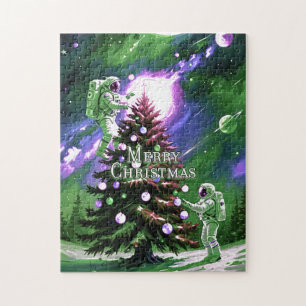 Puzzle Astronautas decoran árbol de Navidad en el espacio
