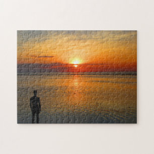 Puzzle atardecer en la playa con hombre