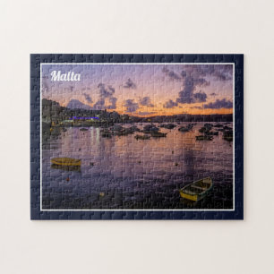 Puzzle Bahía de San Pablo de Malta por noche nublada con