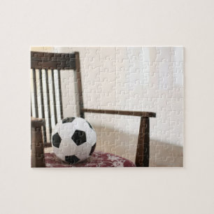 Puzzle Balón de fútbol en la silla