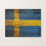 Puzzle Bandera de Suecia en grano de madera viejo<br><div class="desc">Bandera de Suecia en grano de madera viejo No dude en para modificar el diseño según sus propias preferencias. Usted puede cambiar la ubicación del diseño, la orientación, los colores de fondo y el tamaño. También, usted puede añadir su propio texto, o el lema fijó su fuente, ubicación y tamaño,...</div>
