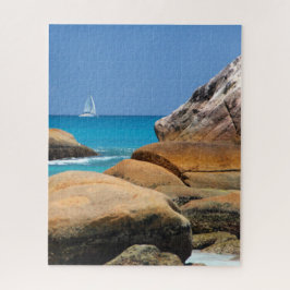 Puzzle Barco de vela que pasa por la playa