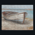 Puzzle Barco encalado en la orilla<br><div class="desc">Barco encalado I de Ethan Harper.Cuenta con un barco bien desgastado descansando en la orilla.</div>