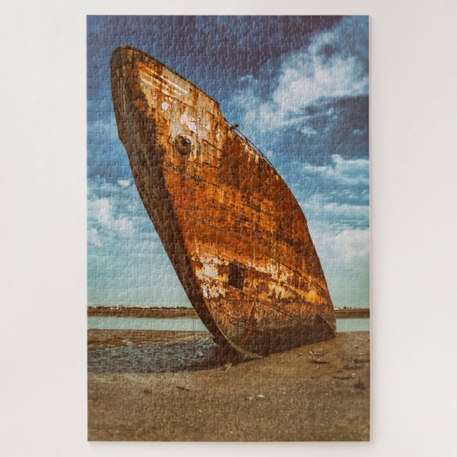 Puzzle Barco naufragado en una playa (Vertical)