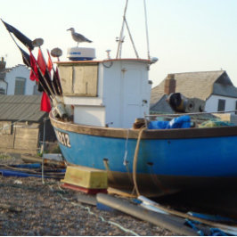 Puzzle barco pesquero amarrado por la foto costera del ma
