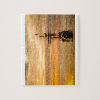 Puzzle Barco pirata en la puesta del sol