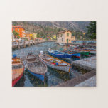 Puzzle Barcos pesqueros en el lago Riva del Garda Italia<br><div class="desc">Este pintoresco rompecabezas presenta coloridos barcos de pesca en el lago de Riva del Garda en Italia.</div>