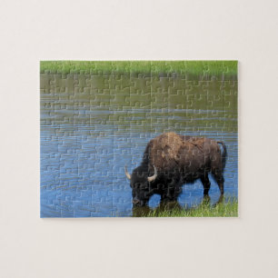 Puzzle Beber de venado de piedra amarilla en el lago