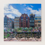 Puzzle Bicicletas Casas a lo largo del Canal de Amsterdam<br><div class="desc">Este impresionante rompecabezas temático de la ciudad cuenta con bicicletas a lo largo del canal de Ámsterdam con edificios en el fondo. Ámsterdam. Países Bajos. Holanda. Canal. Bicicleta. Bicicletas frente al mar. Canal. Europa. Viajes,  aventuras,  rompecabezas.</div>