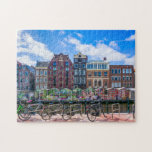 Puzzle Bicicletas Casas a lo largo del Canal de Amsterdam<br><div class="desc">Este impresionante rompecabezas temático de la ciudad cuenta con bicicletas a lo largo del canal de Ámsterdam con edificios en el fondo. Ámsterdam.</div>