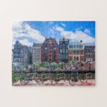 Puzzle Bicicletas Casas a lo largo del Canal de Amsterdam<br><div class="desc">Este impresionante rompecabezas temático de la ciudad cuenta con bicicletas a lo largo del canal de Ámsterdam con edificios en el fondo. Ámsterdam. Países Bajos. Holanda. Canal. Bicicleta. Bicicletas frente al mar. Canal. Europa. Viajes,  aventuras,  rompecabezas.</div>