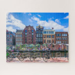 Puzzle Bicicletas Casas a lo largo del Canal de Amsterdam<br><div class="desc">Este impresionante rompecabezas temático de la ciudad cuenta con bicicletas a lo largo del canal de Ámsterdam con edificios en el fondo. Ámsterdam.</div>