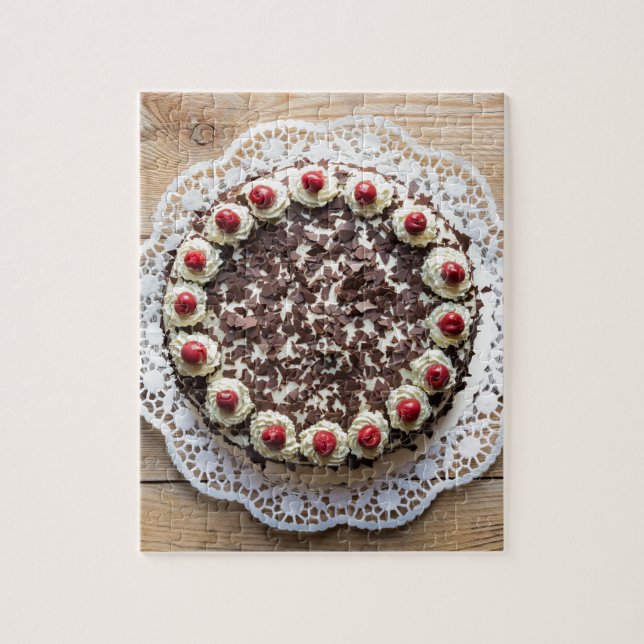 Puzzle Black Forest cake on rustic wood (Vertical)