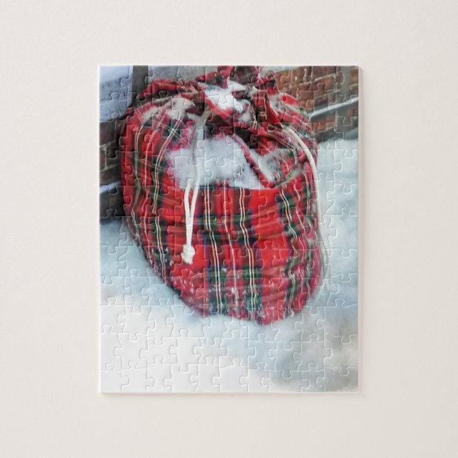 Puzzle Bolsa de Santa Claus en la nieve (Vertical)