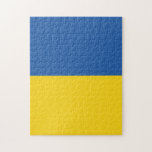 Puzzle Botón Bandera de Ucrania<br><div class="desc">La bandera de Ucrania es una bandera de dos bandas horizontales de igual tamaño de azul y amarillo. La parte superior representa el cielo y el amarillo representa el trigo. La bandera nacional de Ucrania</div>