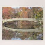 Puzzle Bow Bridge Scenic Reflection Otoño Central Park<br><div class="desc">El puente Bow en Central Park puede parecer lejano hoy en día, pero será de tu agrado cuando esté completo. Una hermosa vista del puente Bow en Central Park. Cualquier pregunta de diseño, sólo envíe un correo electrónico a charmdesignstudio@rcn.com y estaremos encantados de asistirle. Actualmente tiene un tamaño de 11"x14"...</div>