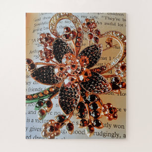 Puzzle Brocha con joyas rojas sobre el fondo de la impres
