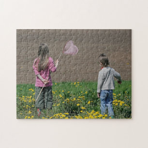Puzzle Brother and sister in summer day.