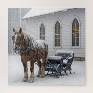 Puzzle Caballo uncido a un trineo junto a una iglesia