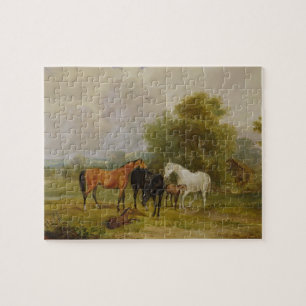 Puzzle Caballos que pastan: Yeguas y potros en un campo