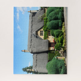 Puzzle Cabaña del tejado cubierto con paja en saltar